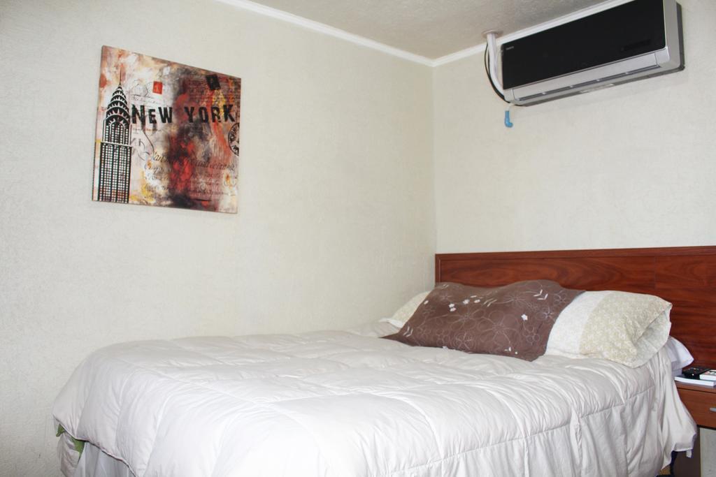 Residencial Victoria Said Hotell Linares Eksteriør bilde
